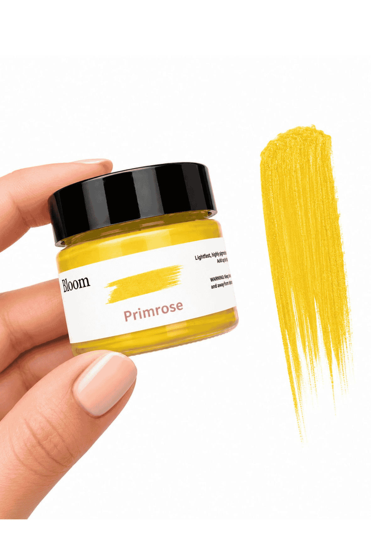 Jar of yellow hair dye with a swatch on a white background