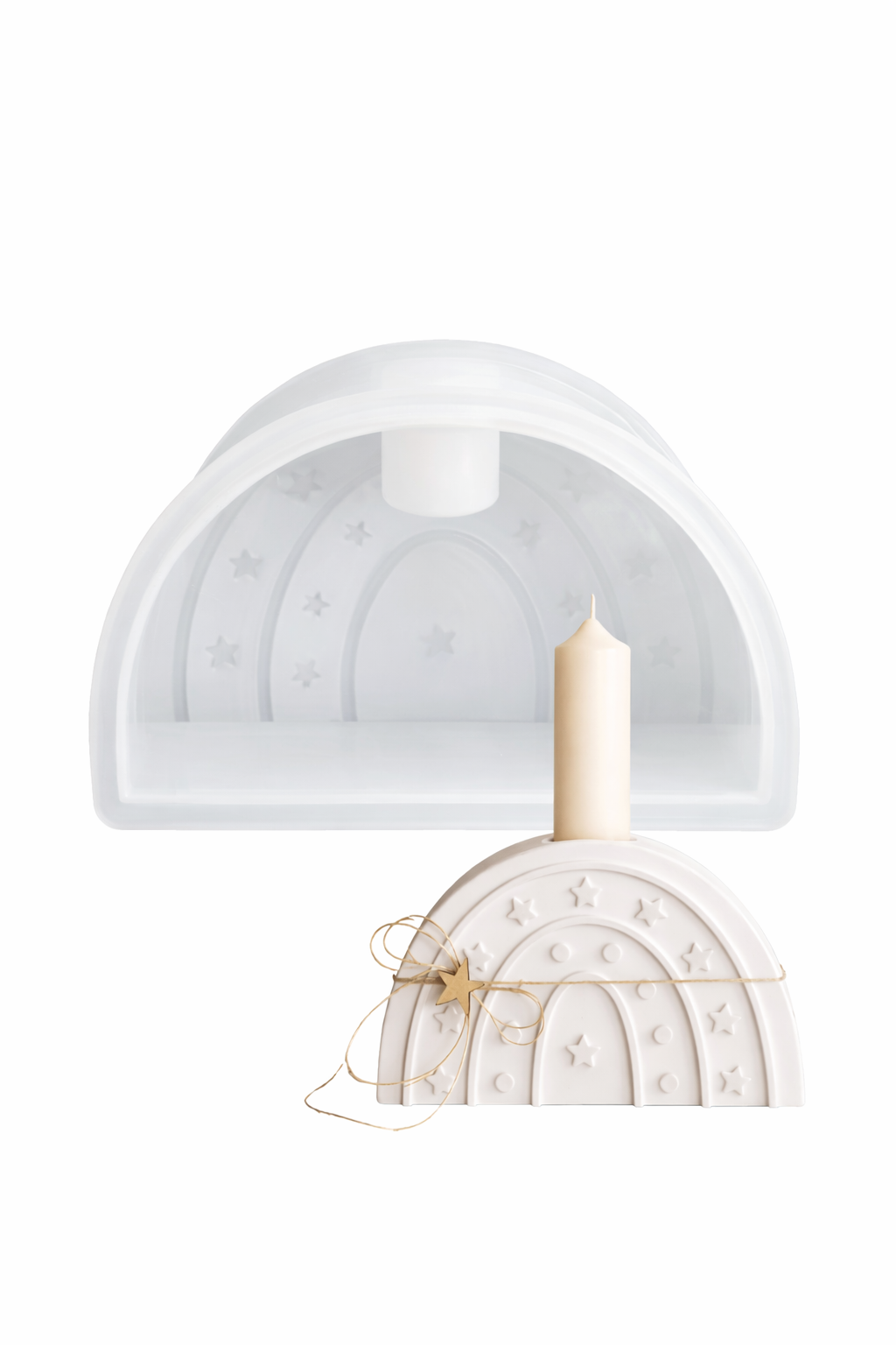 Silicone star-shaped candle mould on white background