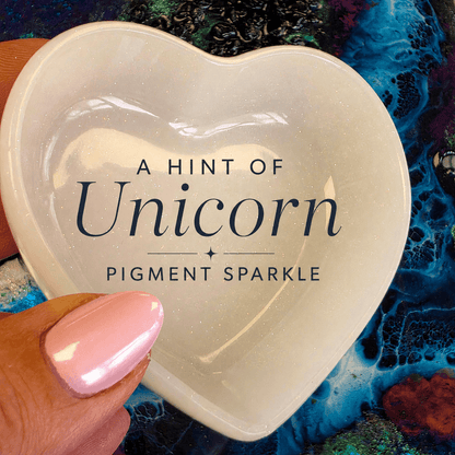 White sparkle heart dish from resin.  pinks and blues, chameleon pigments. 
sparkle for resin
pigment pastes
pigments for resin
epoxy pigment
pigment dye for resin
dyes for resin
dyes for epoxy