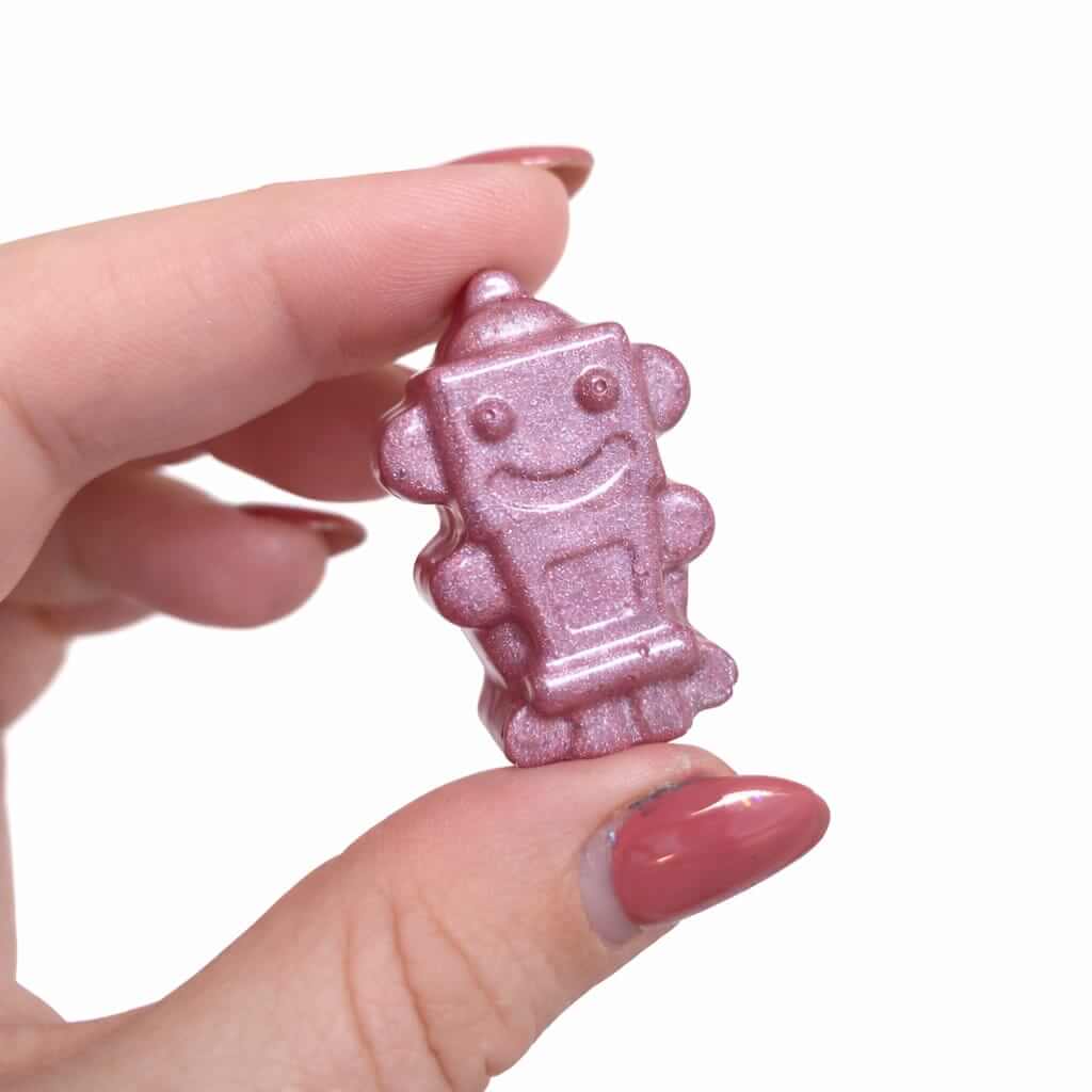 Baby Pink Robot in hand