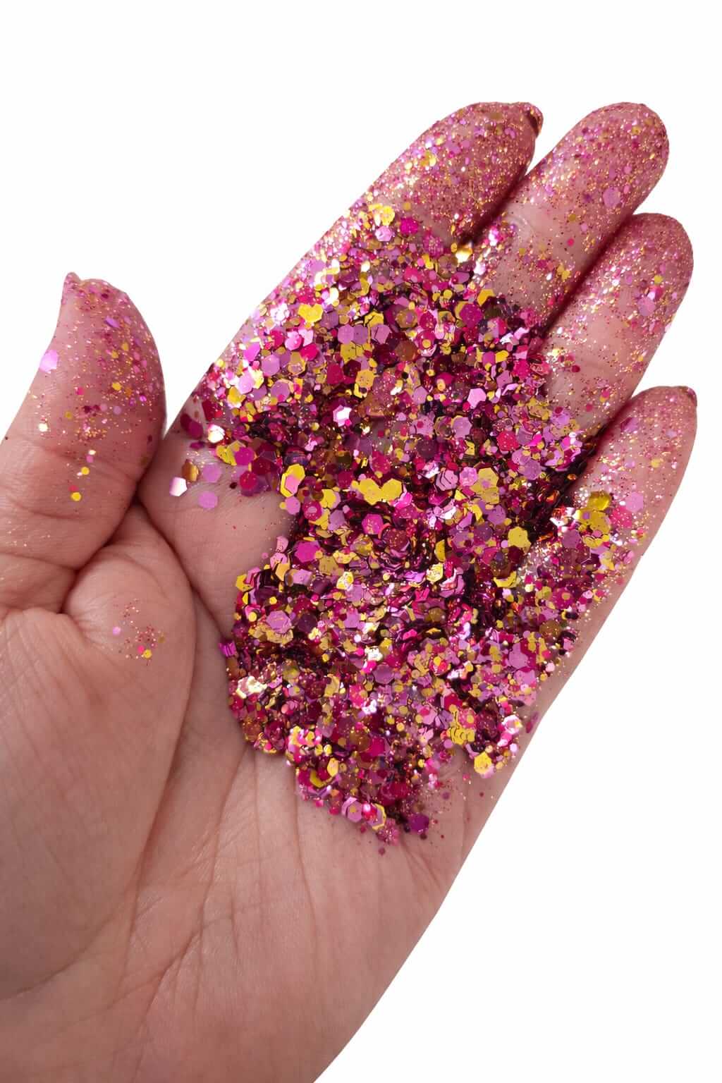 chunky hex red and gold glitter in hand