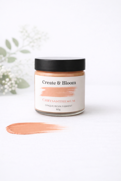 Cool orange pigment in a jar, with a cool orange pigment swatch