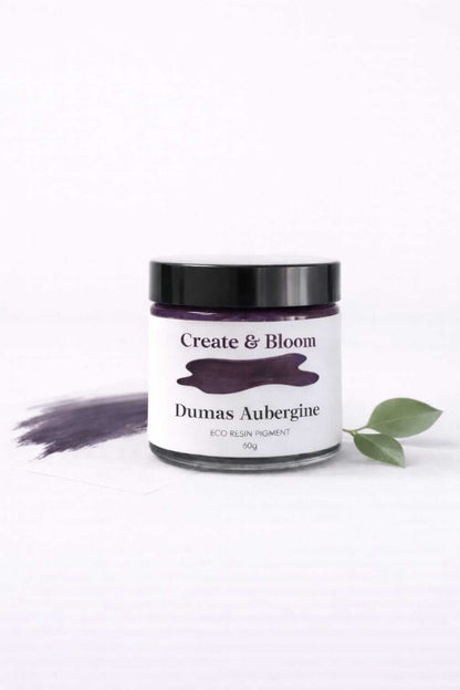 Aubergine pigment in a glass jar