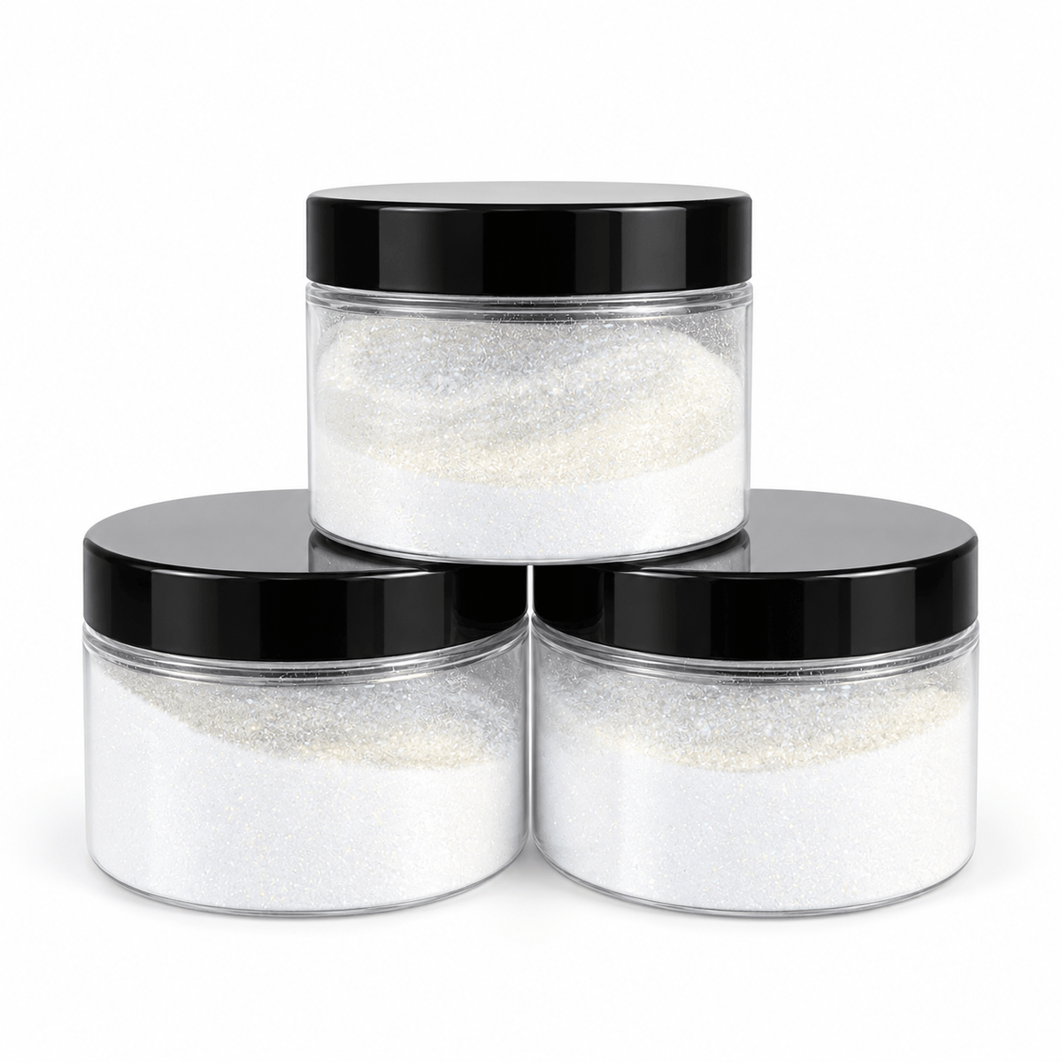 Three clear plastic jars filled with white glitter powder, arranged in a pyramid stack, each with a black screw-on lid, on a solid white background.