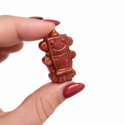 Sandy rose gold pigment mica powder robot in hand