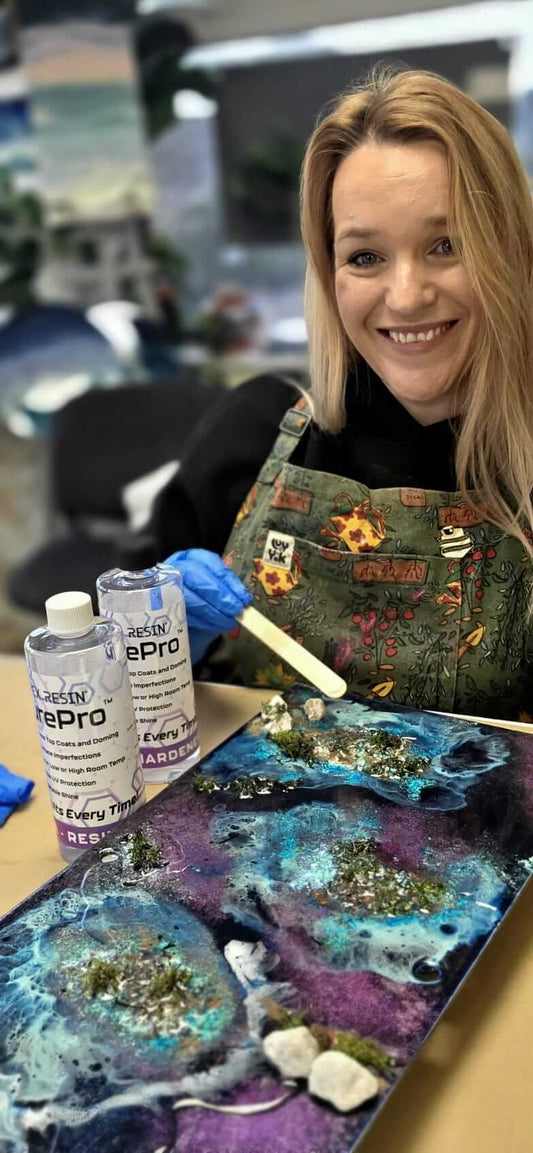 Resin teacher teaching resin ocean art, mixed media