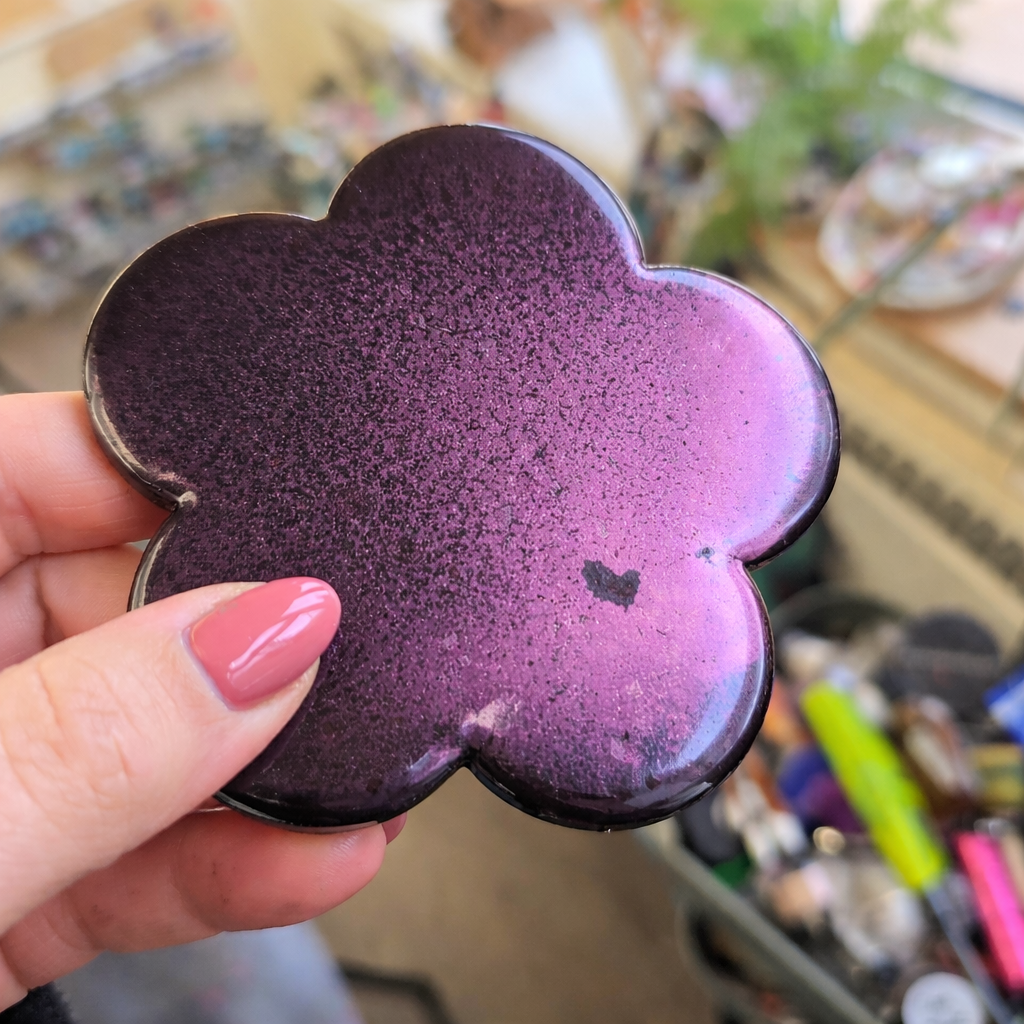 Handcrafted resin flower showing Secret Violet ghost mica with a gentle colour-shift effect and understated sheen.