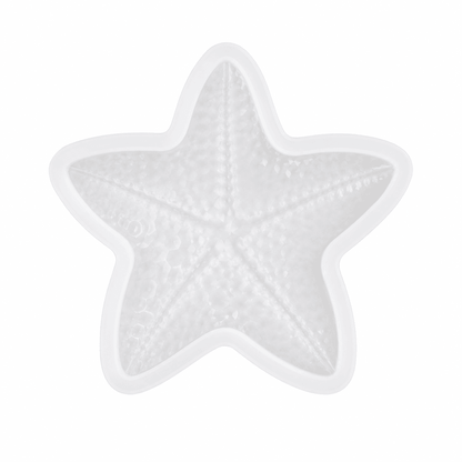 A white silicone mold shaped like a starfish, featuring a textured interior surface and a smooth outer edge, shown on a solid white background.
