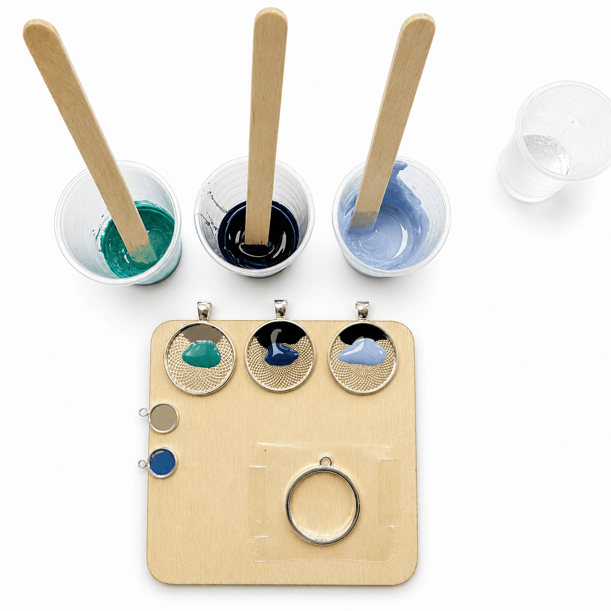 Adding blue resin pigments to ocean-inspired jewellery bezels