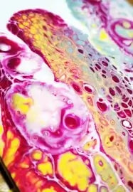 Resin Colour Pop workshop showing dramatic resin pours with vibrant pigments