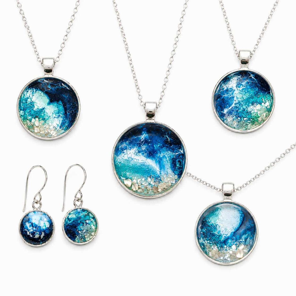 Blue ocean resin necklaces made with Wild Swimming epoxy resin pigments