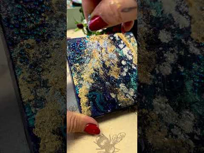Orb glitter, blue glitter on a mixed media piece