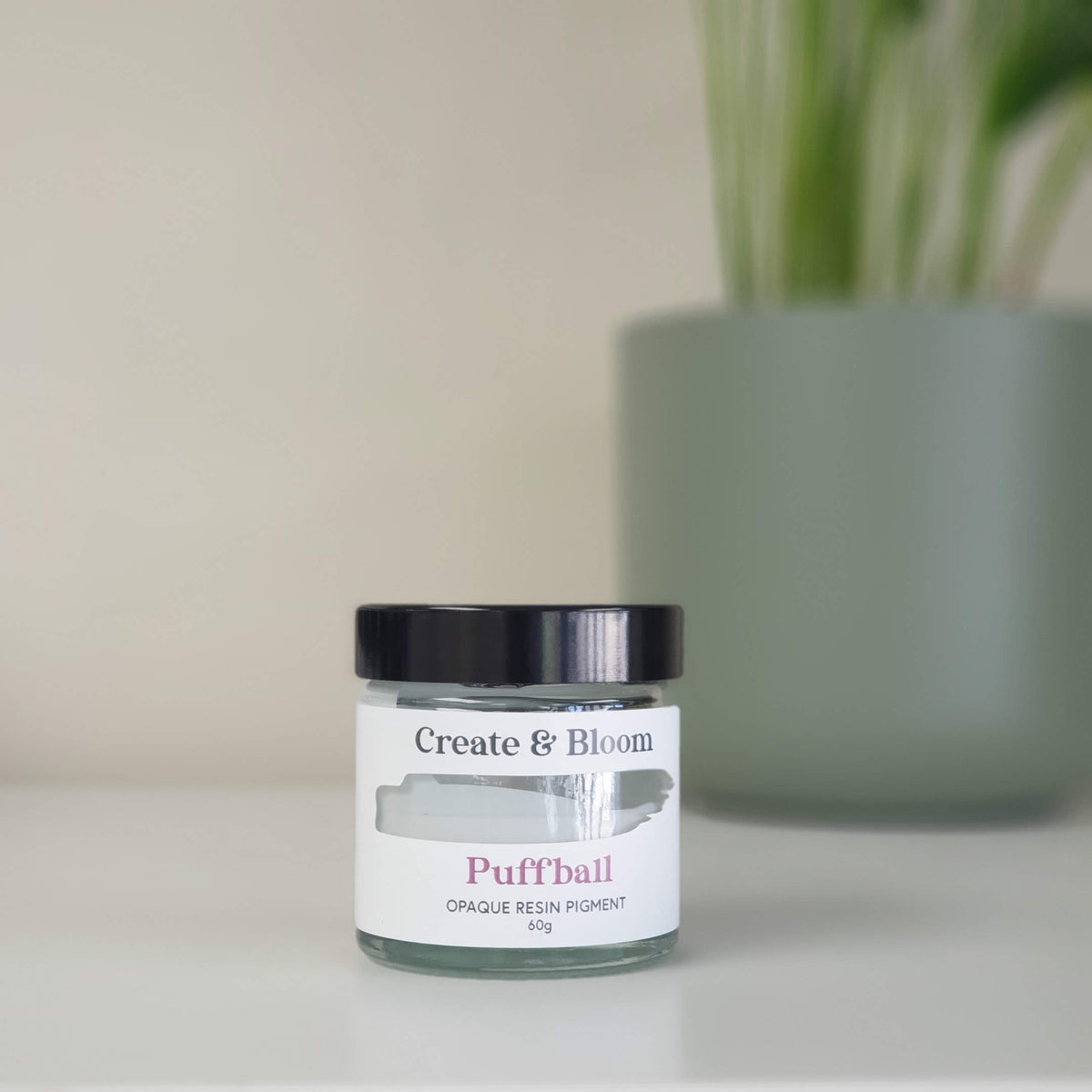 Puffball White opaque white epoxy resin pigment paste by Create & Bloom Crafts in a minimalist studio setting