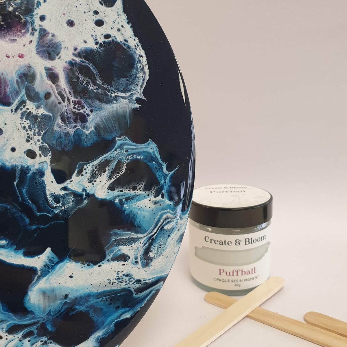 Ocean resin art created with Puffball White pigment showing white lacing, cells and wave effects