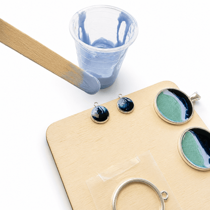 Adding coloured resin to ocean-inspired earring bezels